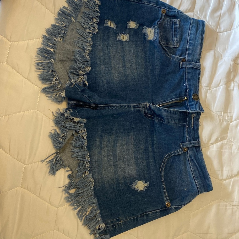 Distressed cut off jean shorts